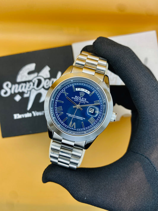 Rolex Stainless Steel Silver with (Blue Roman Dial)